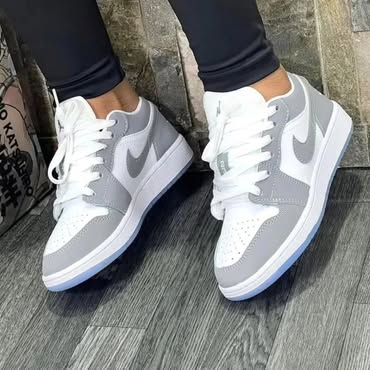 Traditional white nike shoes for men.